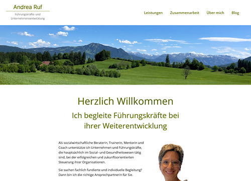 Screenshot Startseite andre-ruf.de mit Alpenlandschaft im Header